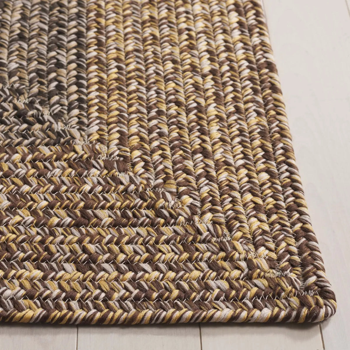 Safavieh Braided 5'-0" x 8'-0" Rug in Brown / Gold