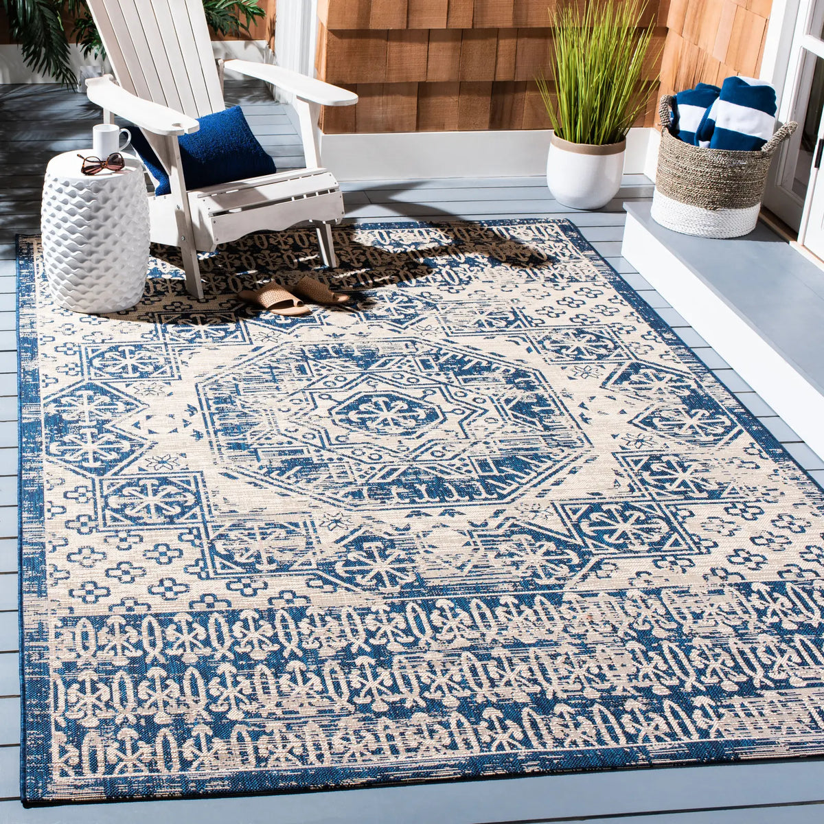 Safavieh Courtyard 6'-7" x 9'-6" Rug in Beige / Navy