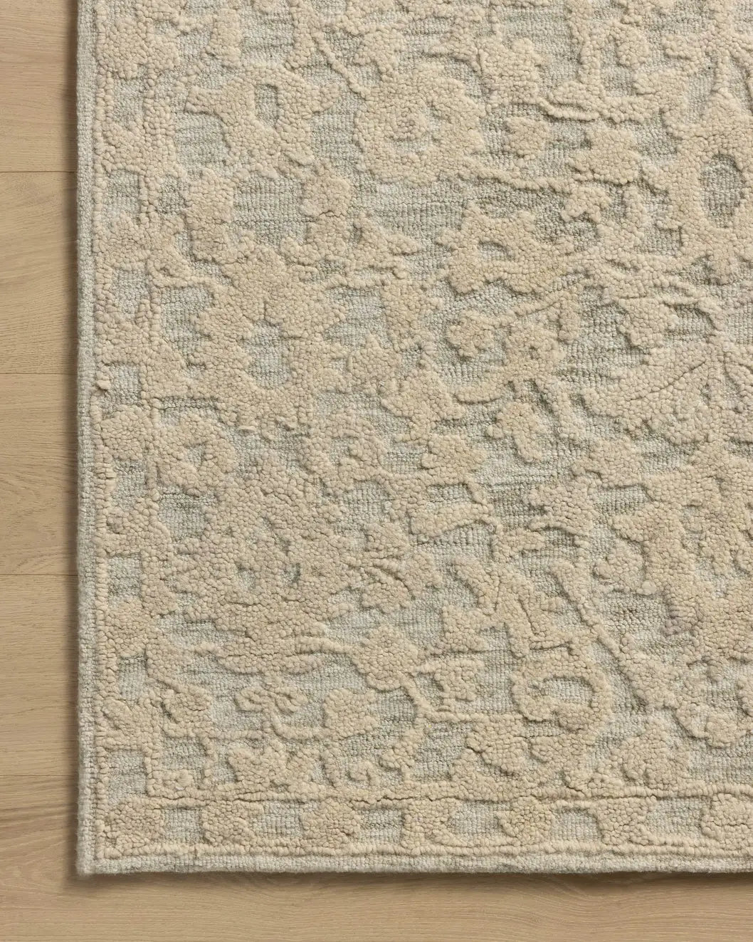 Loloi Prudence PRU-01 Sage / Ivory Hand Tufted Rug - corner on wood