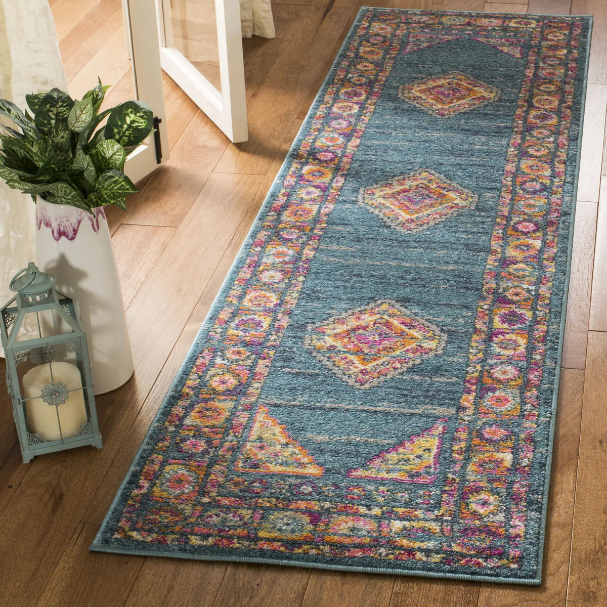 Safavieh Madison 2'-3" x 10'-0" Rug in Light Blue / Orange