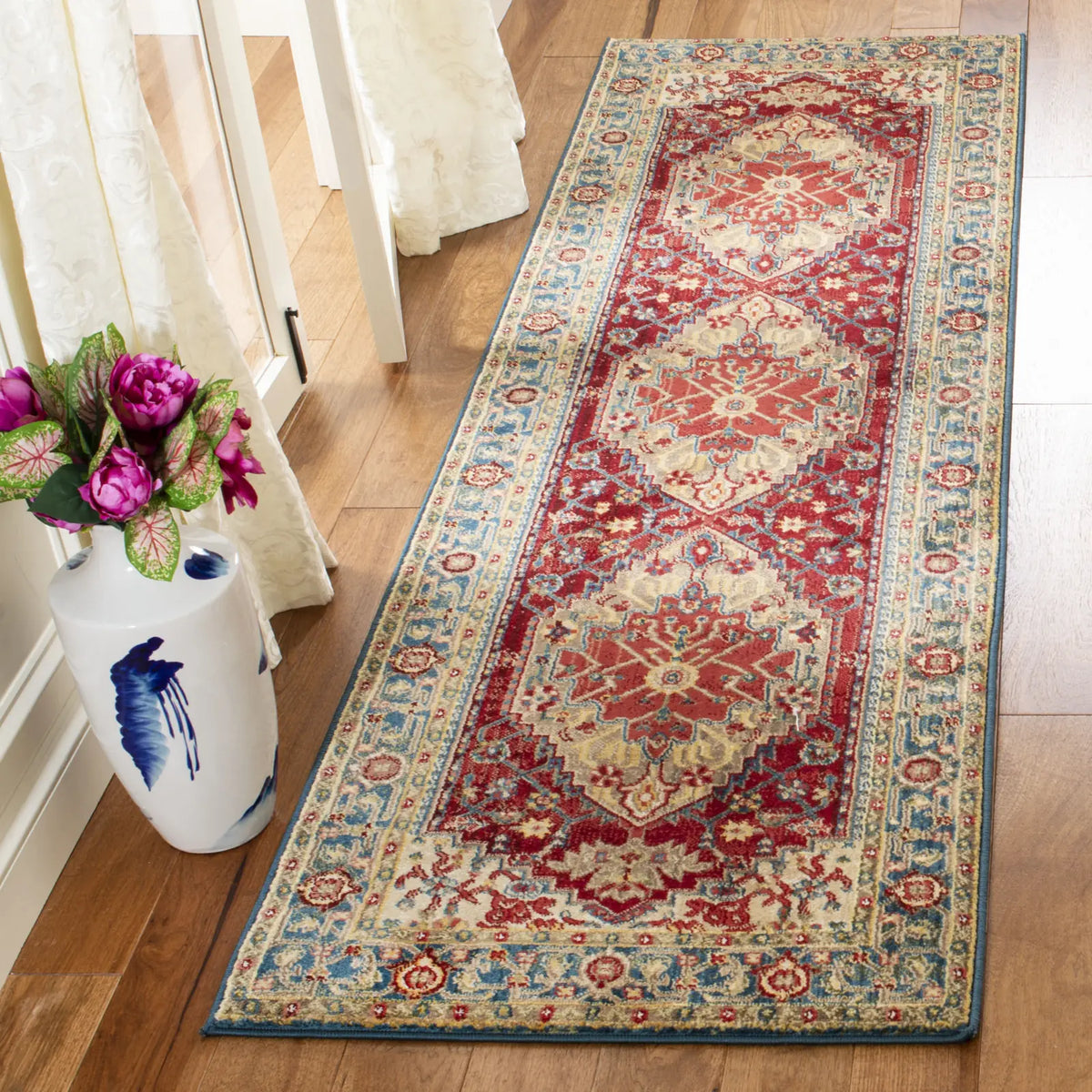 Safavieh Kashan 2'-6" x 10'-0" Rug in Blue / Red