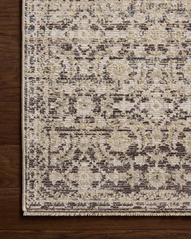 Loloi Milena MLE-03 Linen / Midnight Rug - corner on wood
