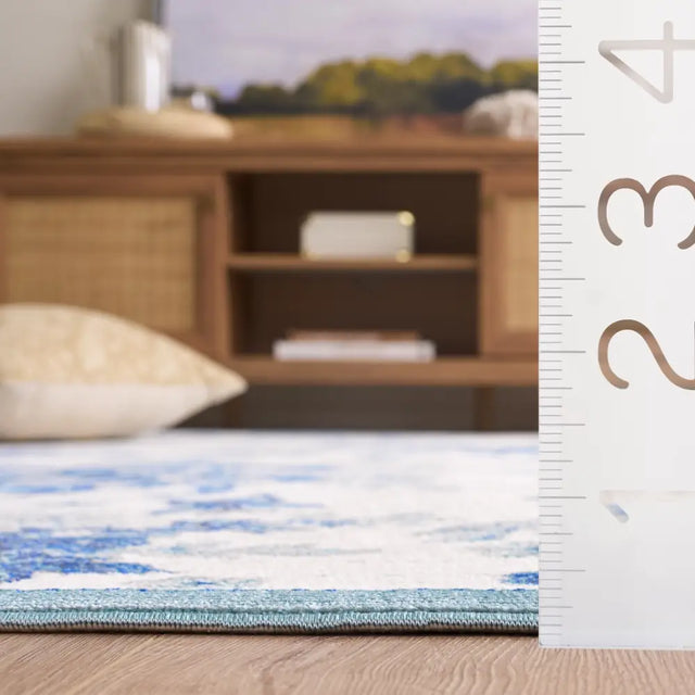 Safavieh Aria 5'-0" x 6'-7" Rug in Ivory / Blue