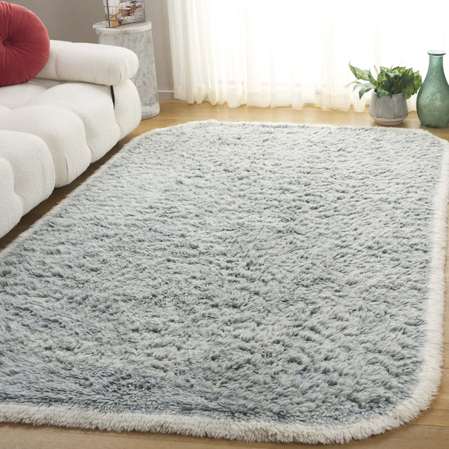 Safavieh Casablanca 4'-0" x 6'-0" Rug in Teal / Ivory
