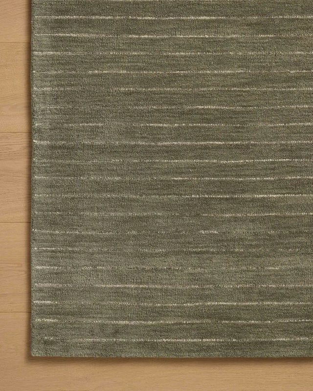 Chris Loves Julia x Loloi Henry HEY-01 Olive / Ivory Rug - corner on wood