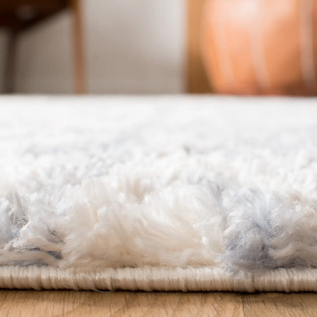 Safavieh Berber Fringe Shag 4'-0" x 6'-0" Rug in Cream / Navy