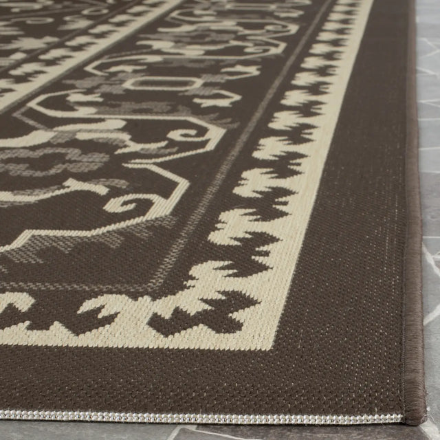 Safavieh Courtyard 6'-7" x 9'-6" Rug in Chocolate / Cream