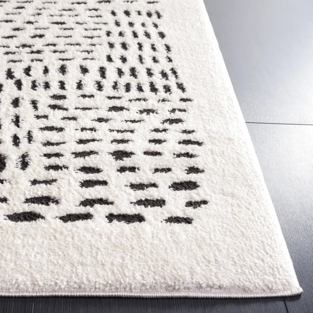 Safavieh Melody 4'-0" x 6'-0" Rug in Ivory / Black