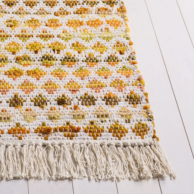Safavieh Montauk 4'-0" x 6'-0" Rug in Yellow / Ivory