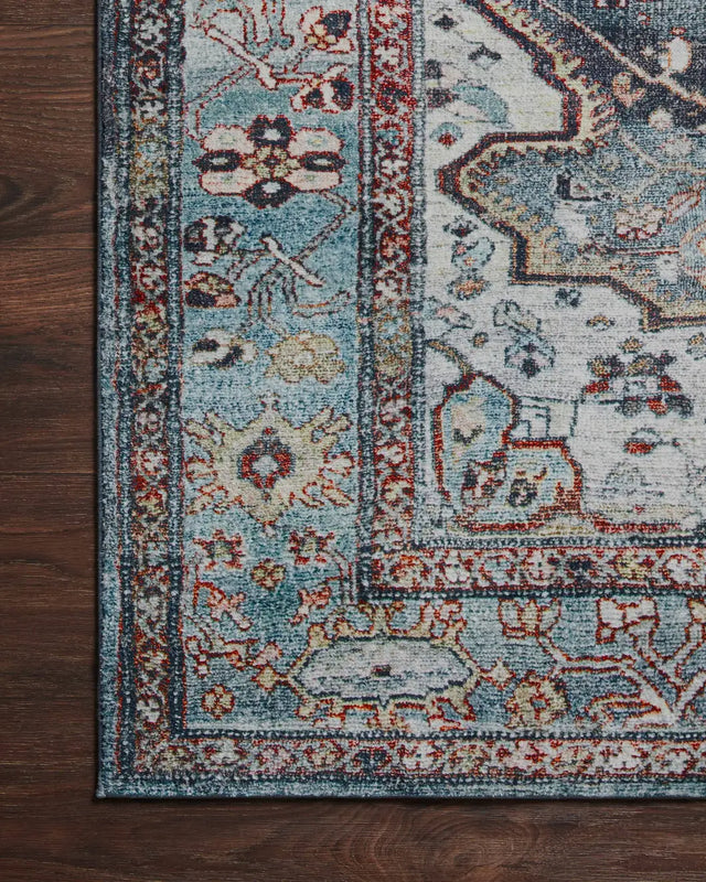 Loloi Margot Mat-05 Ocean/Brick Rugs - corner on wood