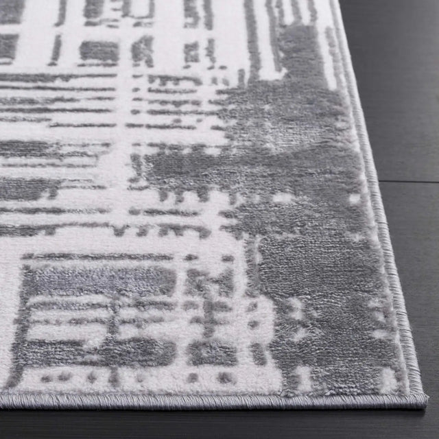 Safavieh Saylor 100 4'-0" x 6'-0" Rug in Ivory / Dark Grey