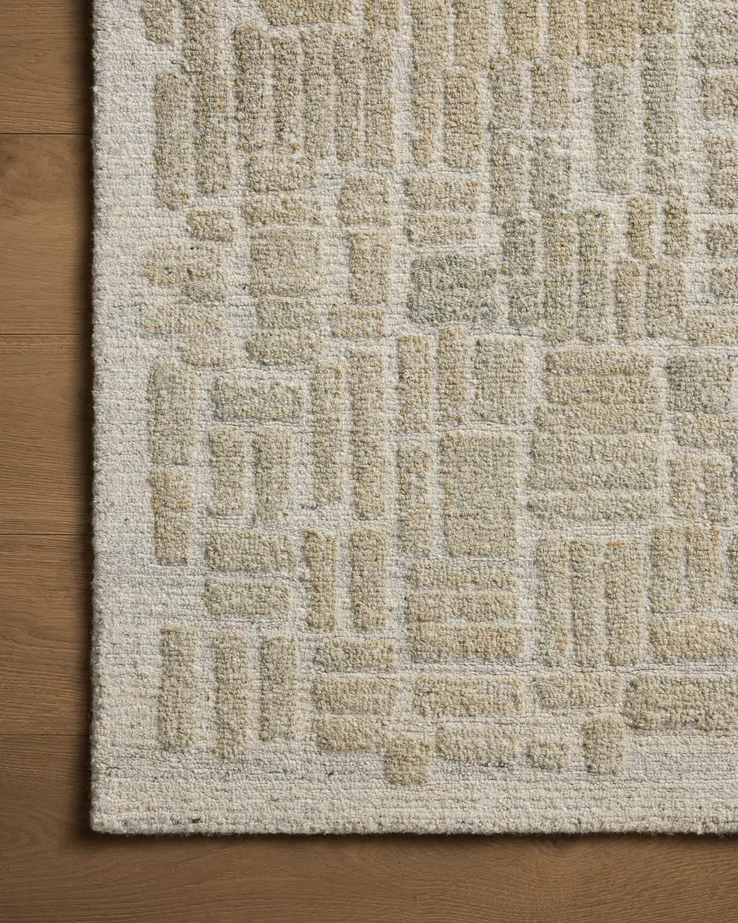 Loloi Elias Ela-01 Pebble/Sage Rug - corner on wood