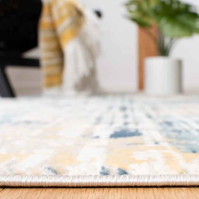 Safavieh Skyler 4'-5" x 6'-5" Rug in Navy / Gold