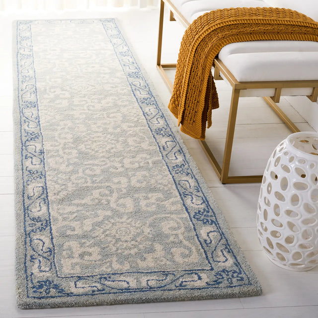 Safavieh Antiquity 2'-3" x 9'-0" Rug in Light Blue / Ivory