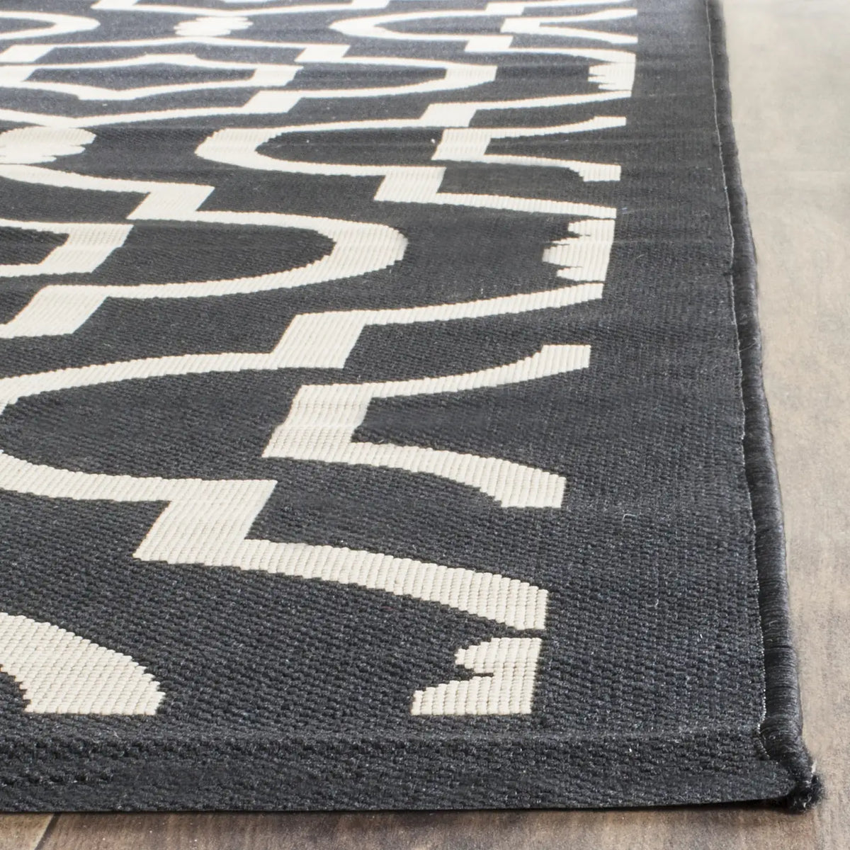 Safavieh Courtyard 6'-7" x 9'-6" Rug in Black / Beige