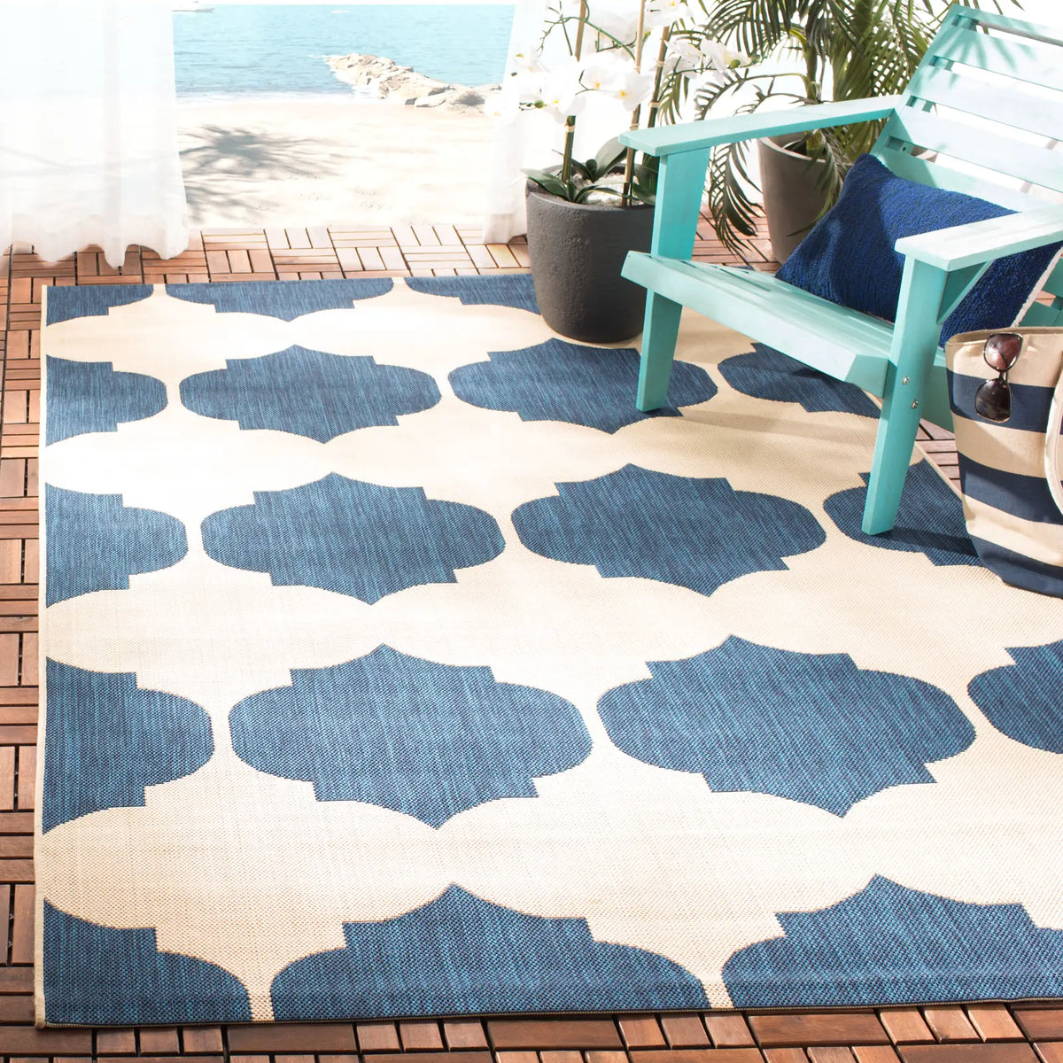 Safavieh Courtyard 5'-3" x 7'-7" Rug in Beige / Navy