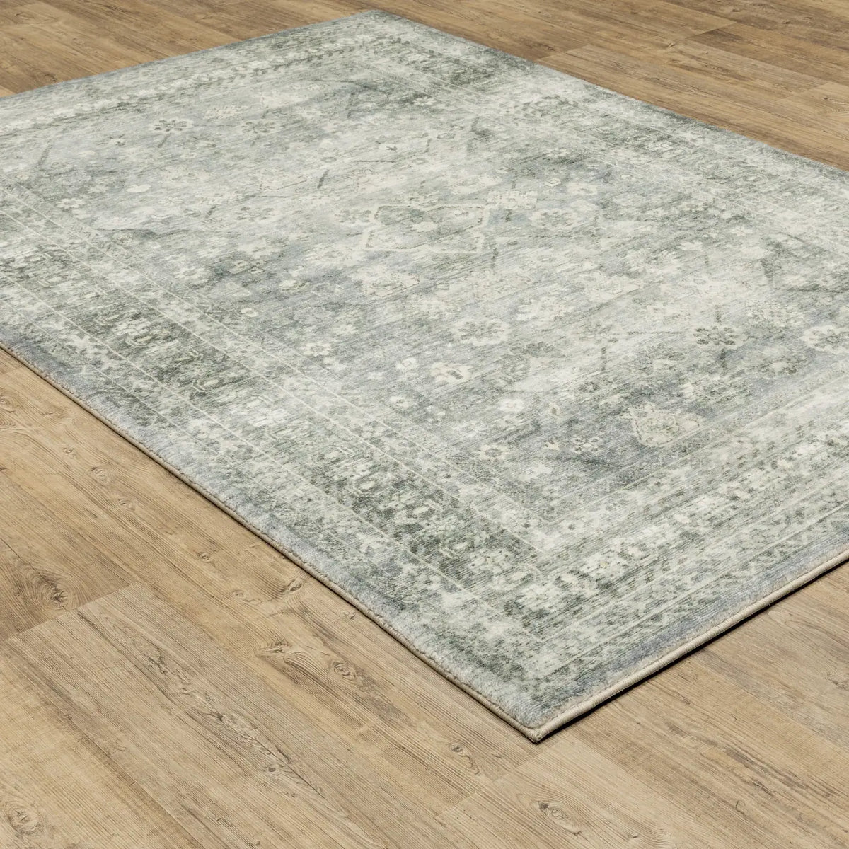 Oriental Weavers Savoy 28106 Blue/ Ivory Rug - angle detail