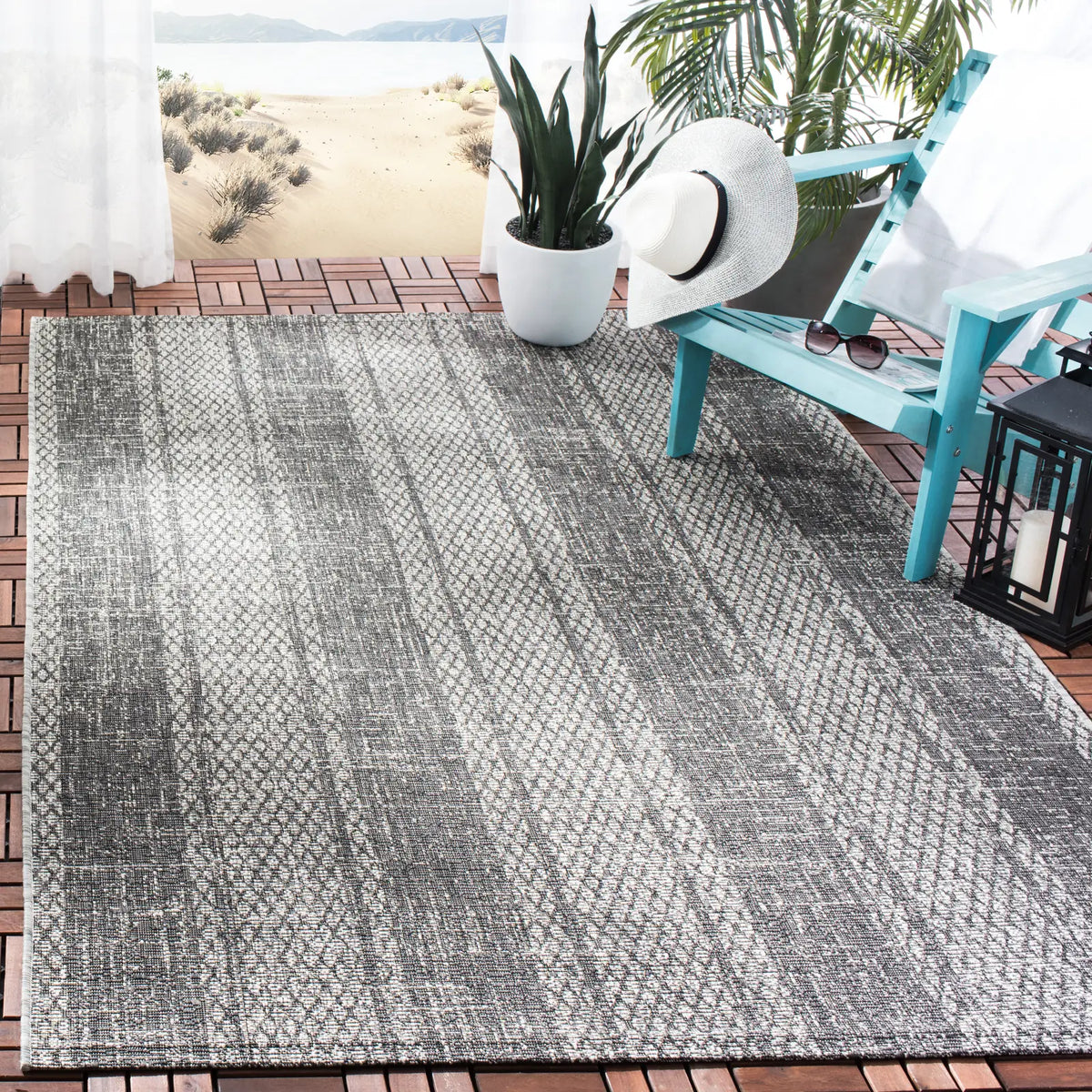 Safavieh Courtyard 5'-3" x 7'-7" Rug in Light Grey / Black