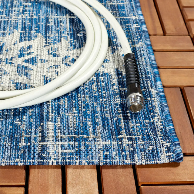 Safavieh Courtyard 6'-7" x 9'-6" Rug in Navy / Grey