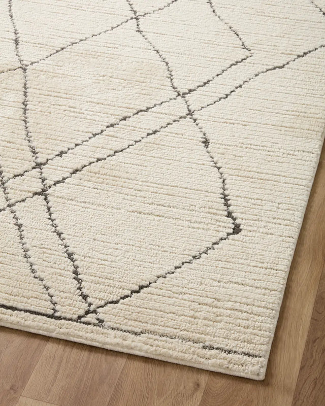 Loloi Fabian Fab-02 Ivory/Charcoal Rug - angled corner on wood