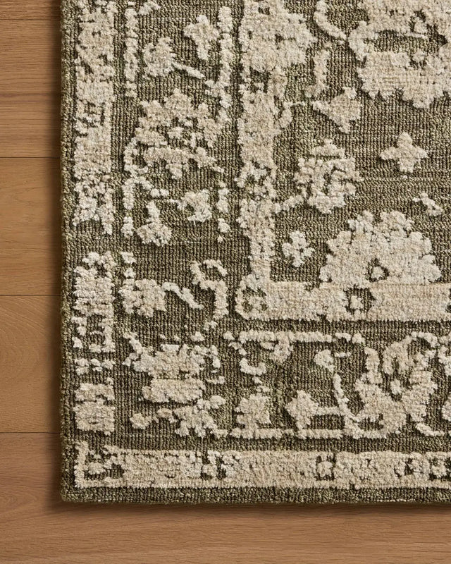 Loloi Percival PCV-06 Moss / Natural Rug - corner on wood