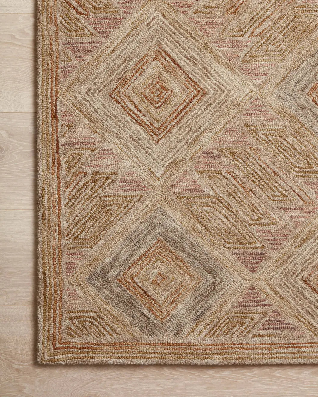 Loloi Varena Var-02 Berry/Multi Rug - corner on wood