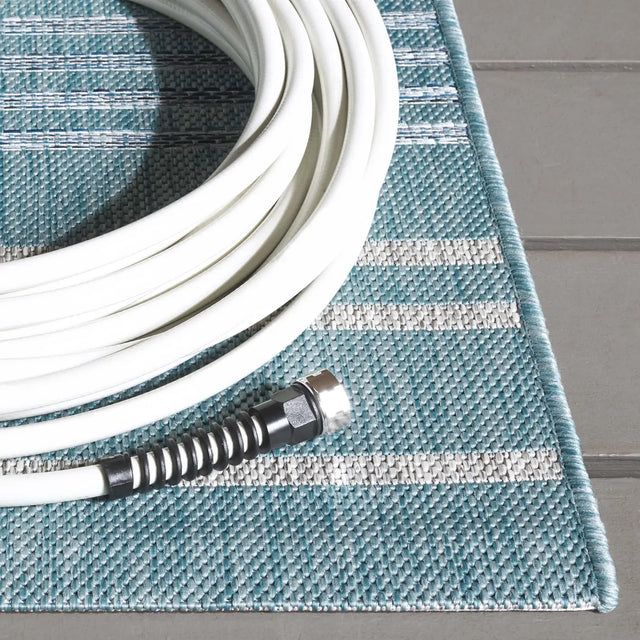 Safavieh Courtyard 5'-3" x 7'-7" Rug in Aqua / Grey