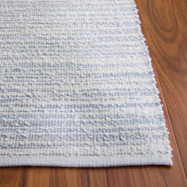 Safavieh Renewal 4'-0" x 6'-0" Rug in Light Blue / Ivory