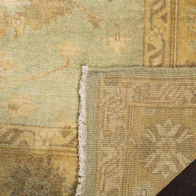 Safavieh Oushak 6'-0" x 9'-0" Rug in Light Blue / Gold