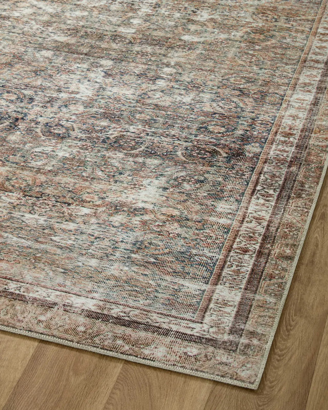 Chris Loves Julia x Loloi Jules 9-Jul Ink / Terracotta Rug - angled corner on wood