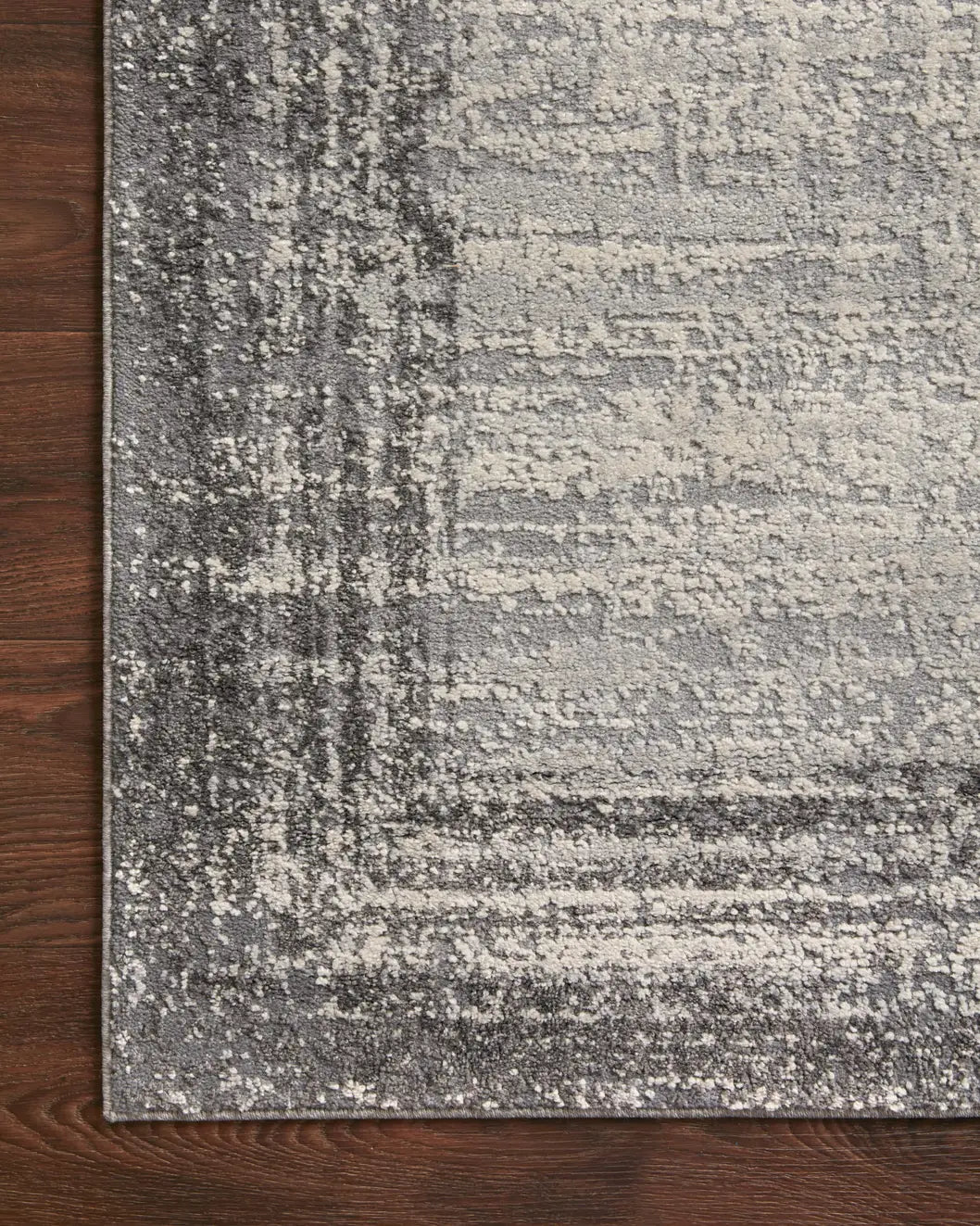 Loloi Austen Aus-02 Pebble/Charcoal Rugs - corner on wood