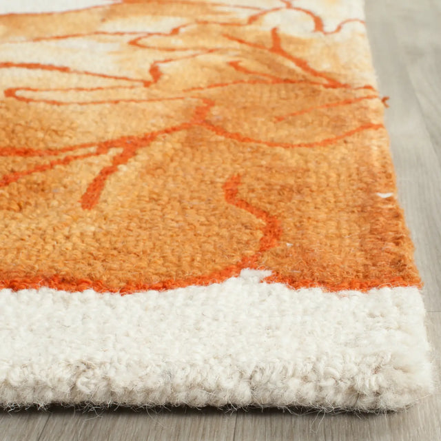 Safavieh Dip Dye 8'-0" x 10'-0" Rug in Ivory / Orange