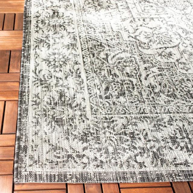 Safavieh Courtyard 5'-3" x 7'-7" Rug in Slate / Grey