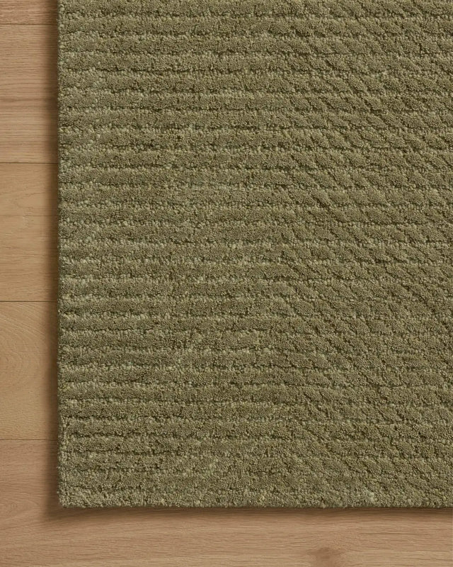 Loloi Kai KAI-01 Olive Rug - corner on wood