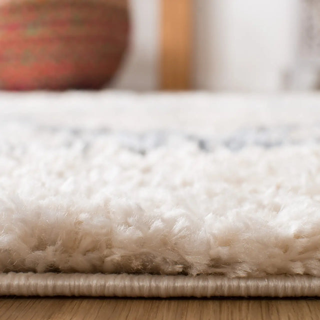 Safavieh Berber Fringe Shag 5'-3" x 7'-6" Rug in Cream / Grey