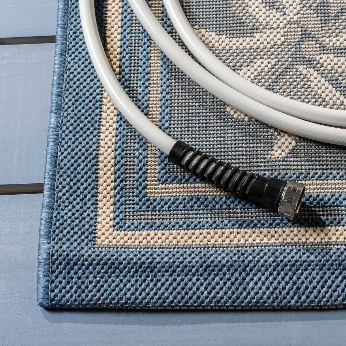 Safavieh Courtyard 6'-7" x 9'-6" Rug in Blue / Ivory