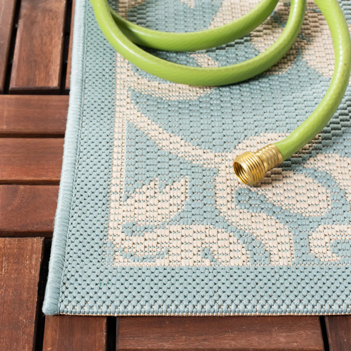 Safavieh Courtyard 5'-3" x 7'-7" Rug in Aqua / Cream