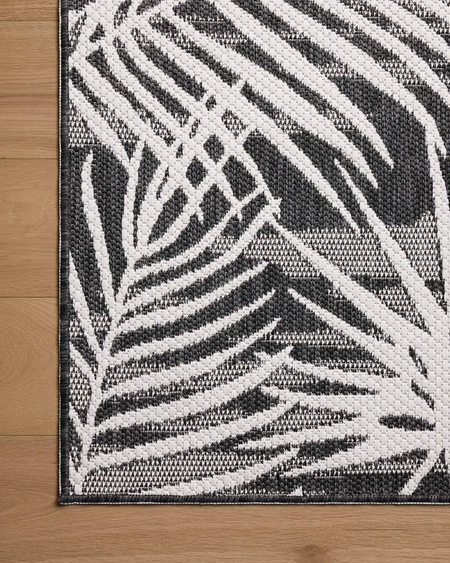 Loloi Easton ESN-09 Ivory / Onyx Rug - corner on wood