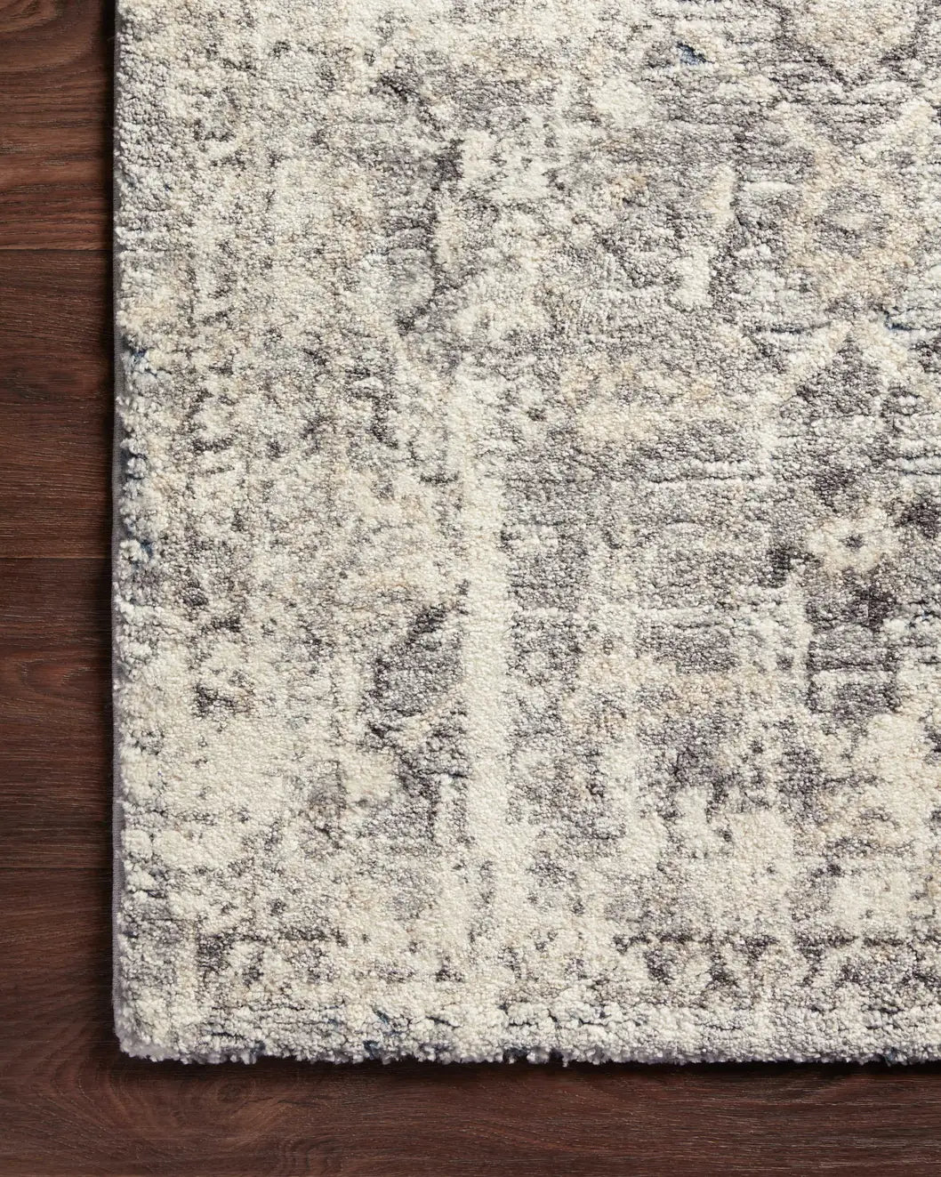 Loloi Theory Thy-03 Natural/Grey Rugs - corner on wood