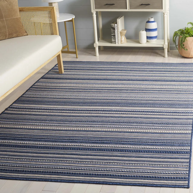Safavieh Escape 700 5'-3" x 7'-6" Rug in Blue / Beige