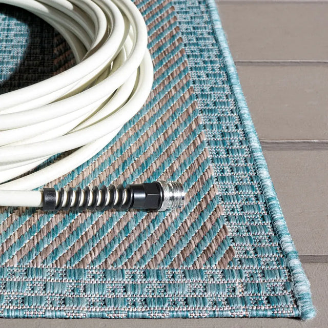 Safavieh Courtyard 5'-3" x 7'-7" Rug in Aqua / Grey