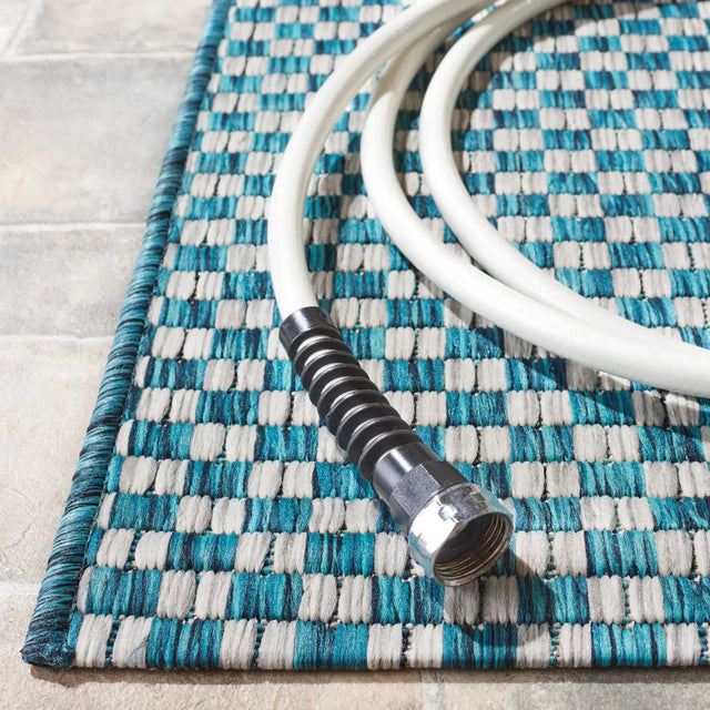 Safavieh Courtyard 4'-0" x 5'-7" Rug in Turquoise / Light Grey