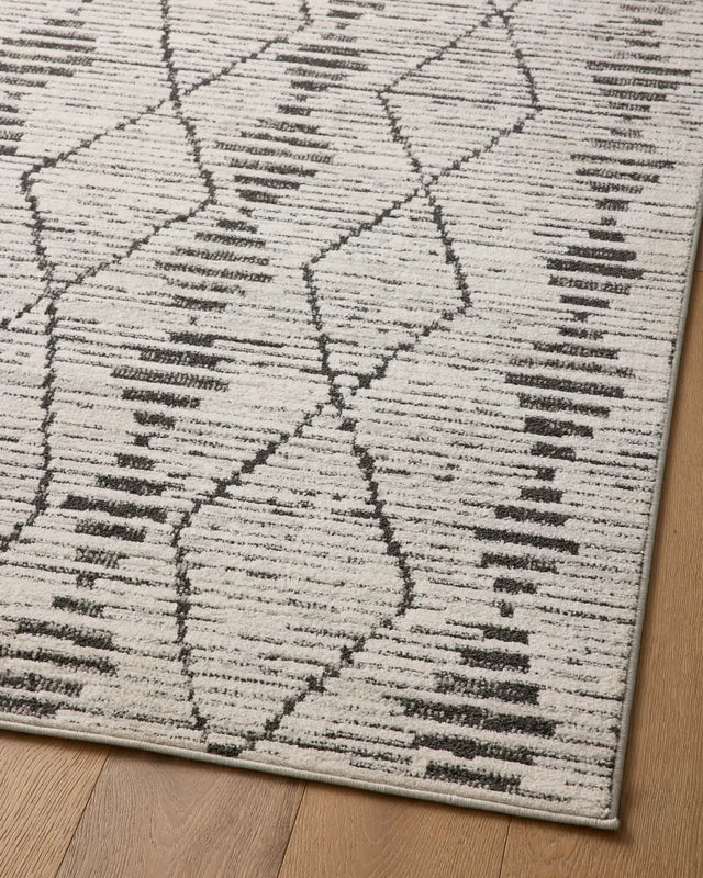 Loloi Kamala Kam-02 Charcoal/Dove Rug - angled corner on wood