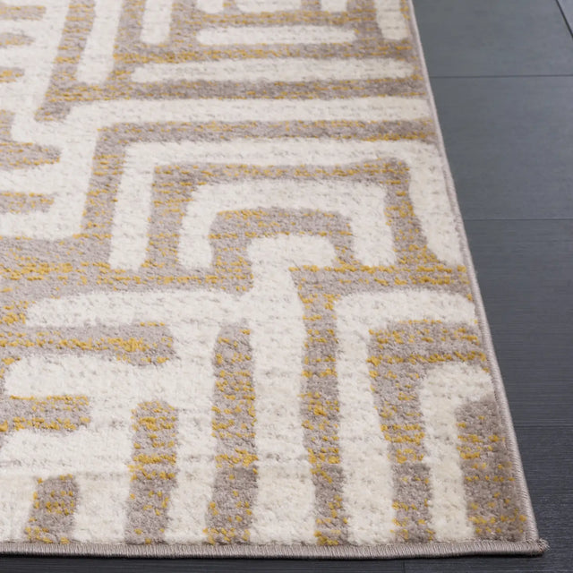 Safavieh Amsterdam 5'-1" x 7'-6" Rug in Ivory / Mauve
