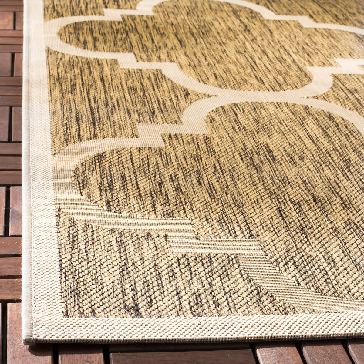 Safavieh Courtyard 5'-3" x 7'-7" Rug in Brown