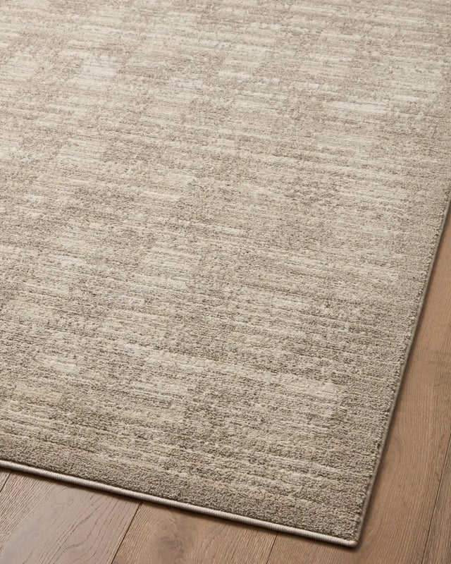 Loloi Darby Dar-07 Pebble/Sand Rug - angled corner on wood
