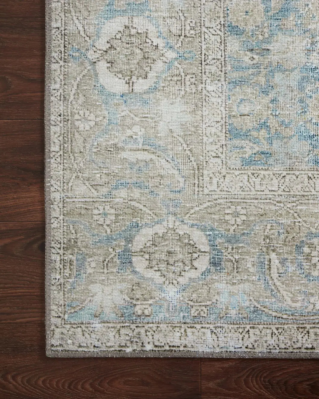Loloi Wynter Wyn-10 Ocean/Silver Rugs - corner on wood