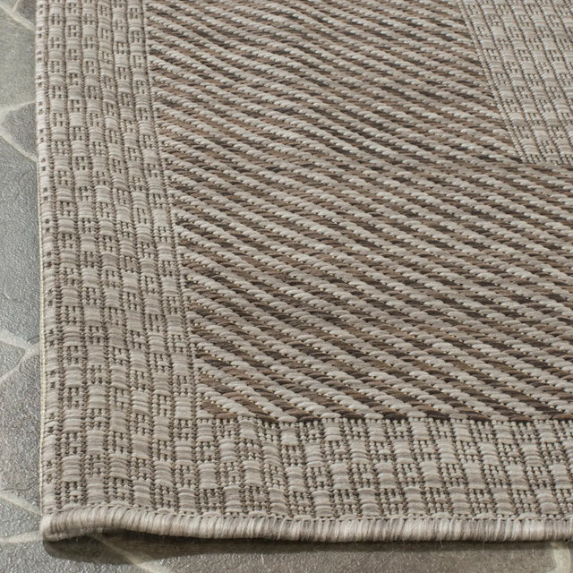 Safavieh Courtyard 6'-7" x 9'-6" Rug in Beige / Brown