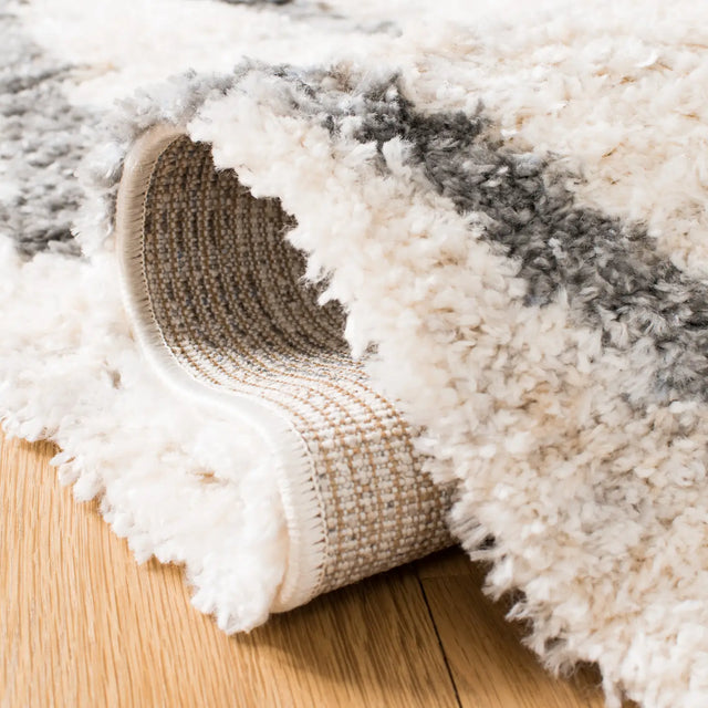 Safavieh Berber Fringe Shag 5'-3" x 7'-6" Rug in Creme / Black