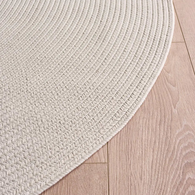 Safavieh Braided 5'-0" x 8'-0" Rug in Cream
